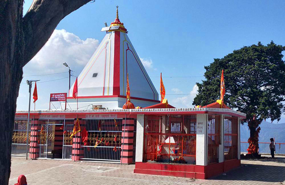 Kunjapuri Devi Temple at sunrise with panoramic Himalayan peaks and Ganges valley view near Rishikesh